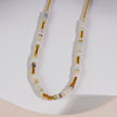 ISHANI: Pink Aventurine Stones and Gold Beaded Necklace
