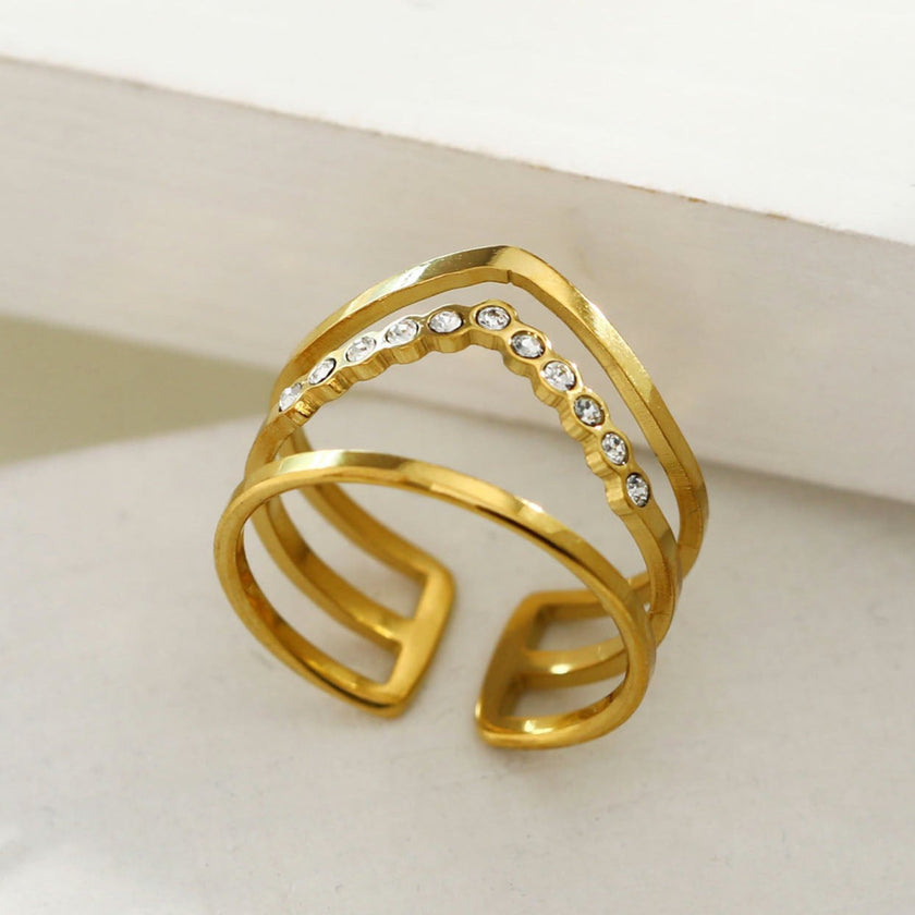 Bague JUAANA à trois rangées de zircons.