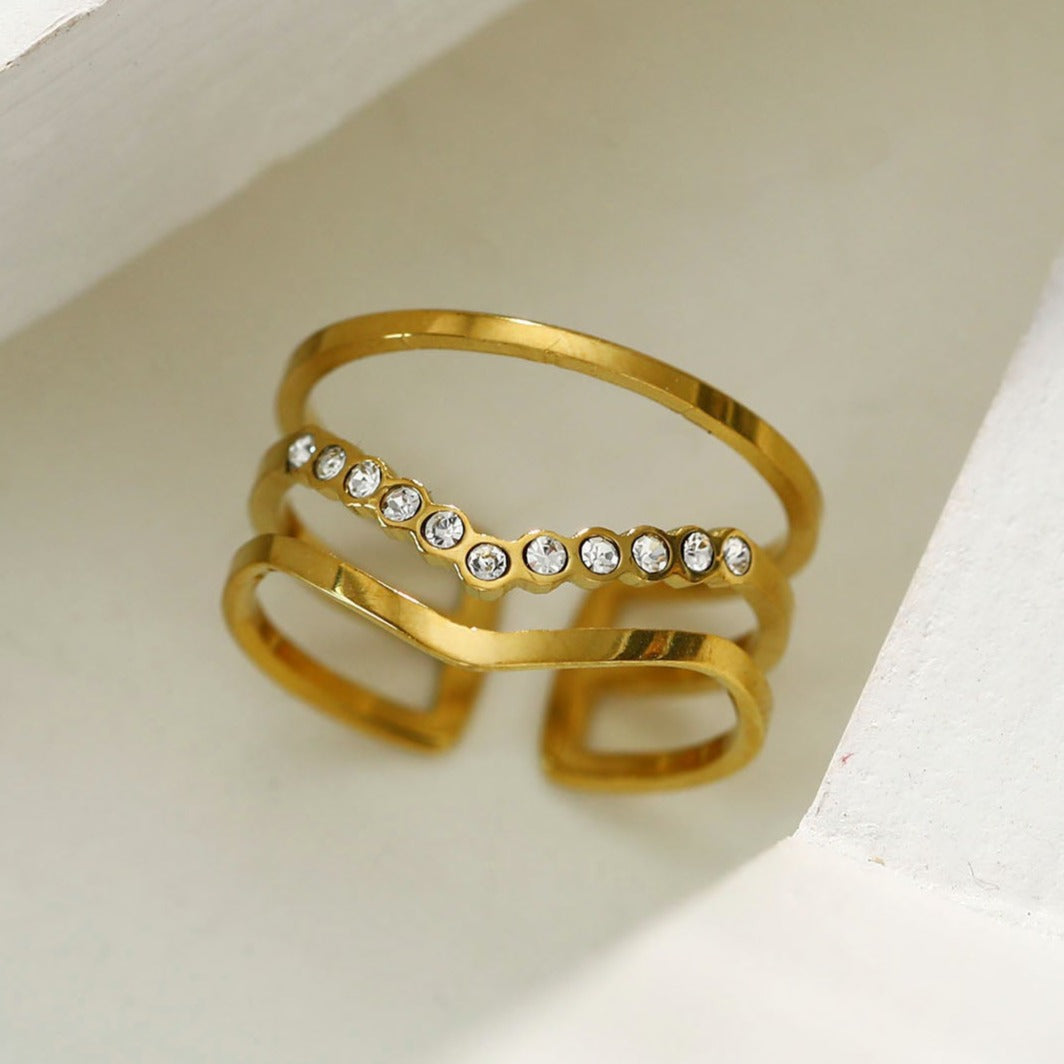 Bague JUAANA à trois rangées de zircons.