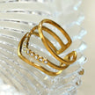 Bague JUAANA à trois rangées de zircons.