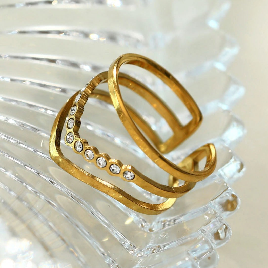 Bague JUAANA à trois rangées de zircons.