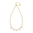 Style KALPI : Collier en chaîne à perles et zircons dorés.