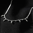 Style KALPI : Collier en chaîne avec perles et zircons, couleur argent.