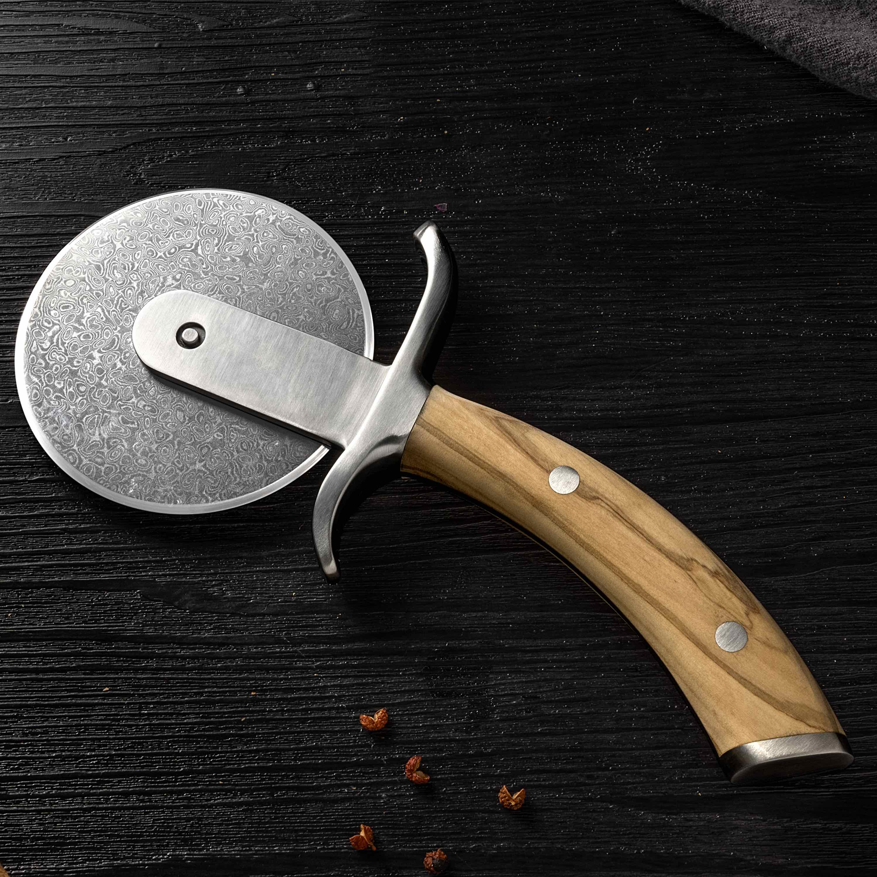 Coupe-pizza Ginza Steel MIA – Lame en acier inoxydable avec manche en bois d'olivier