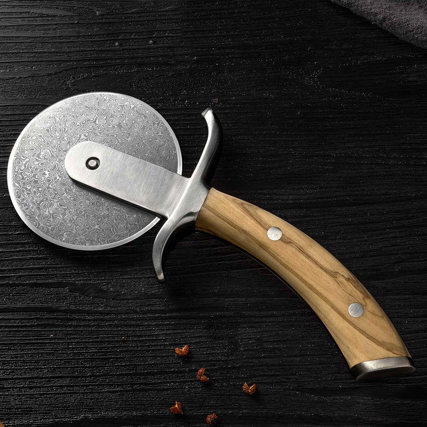 Coupe-pizza Ginza Steel MIA – Lame en acier inoxydable avec manche en bois d'olivier