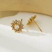 KERELA Gold : Boucles d'oreilles en forme d'étoile scintillante en zircone (CZ)