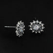 KERELA White Gold (Silver Toned): Shimmering Star Zirconia Stud Earrings