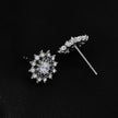 KERELA White Gold (Silver Toned): Shimmering Star Zirconia Stud Earrings