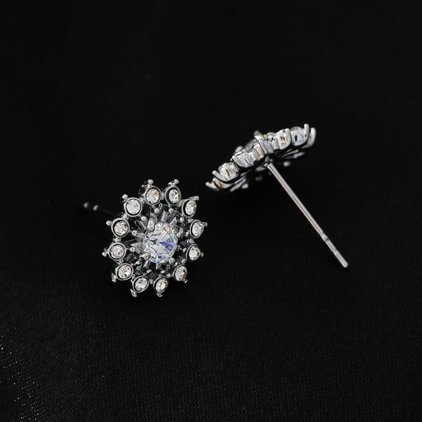 KERELA White Gold (Silver Toned): Shimmering Star Zirconia Stud Earrings