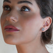 KERELA White Gold (Silver Toned): Shimmering Star Zirconia Stud Earrings