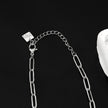 Style KORATIA: Minimalist Chain Necklace with Zirconia Gemstones in Silver