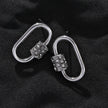 Boucles d'oreilles à mousqueton en argent LENNON avec accents de zircone pavée.