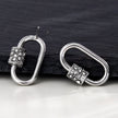 Boucles d'oreilles à mousqueton en argent LENNON avec accents de zircone pavée.