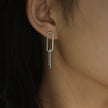 Boucles d'oreilles argentées LUCIANA, double agrafe, pavé de zircons.