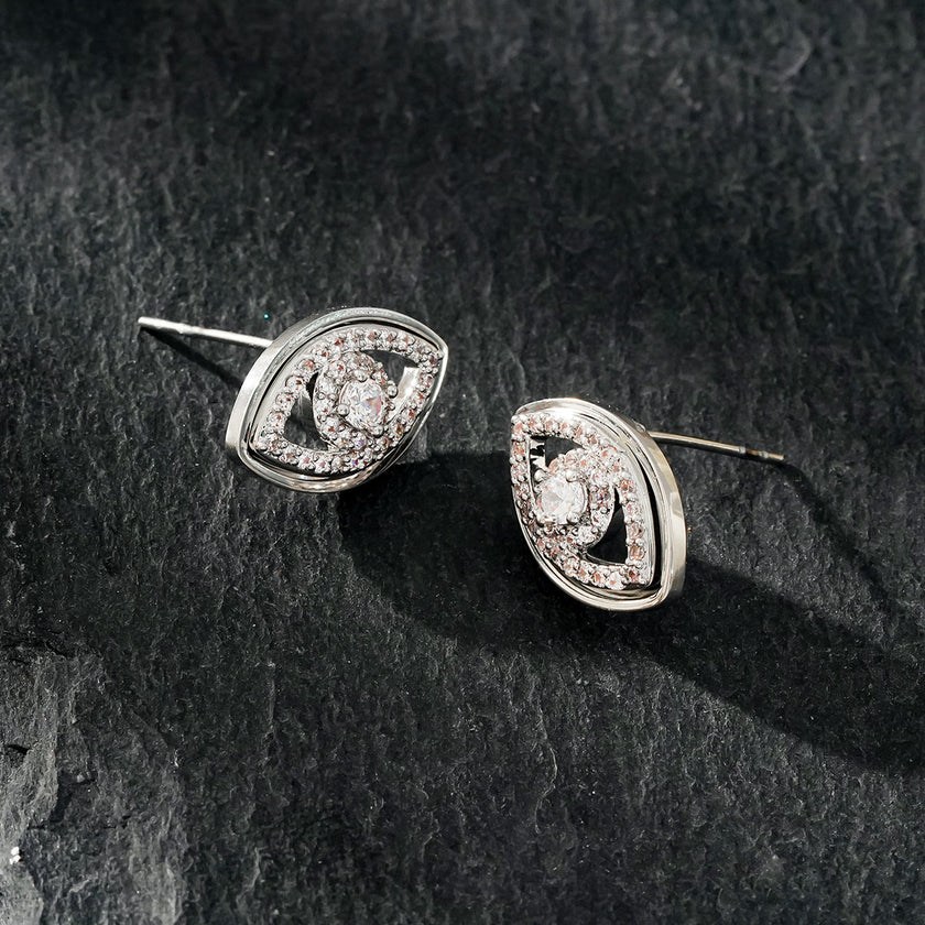 Boucles d'oreilles Lucky Eye en or blanc (ton argenté) : boucles d'oreilles œil maléfique ornées de zircone (CZ).