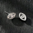 Boucles d'oreilles Lucky Eye en or blanc (ton argenté) : boucles d'oreilles œil maléfique ornées de zircone (CZ).