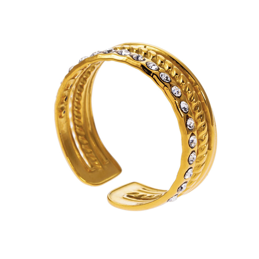 LUMINA : Bague ornée de plusieurs rangées de zircons.