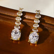 MALIA: Radiant Cascading Zirconia Drop Earrings