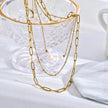 MARLI 3-Layer Multi Chain Gold Necklace featuring Natural Pearls