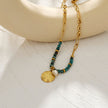 MEDELLIN : Chaîne contemporaine avec perles de turquoise africaine et duo de pendentifs.