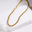 Style MILLIE : Collier en chaîne dorée à double perles.