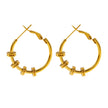 MINATO: Modernist Hoop Earrings Anchoring Industrial-Chic Double Discs.