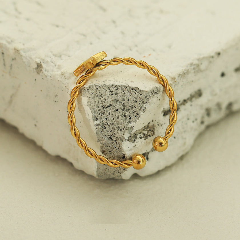 NICOLE Gold: Textured Ring with a Four Point Star Centre Piece