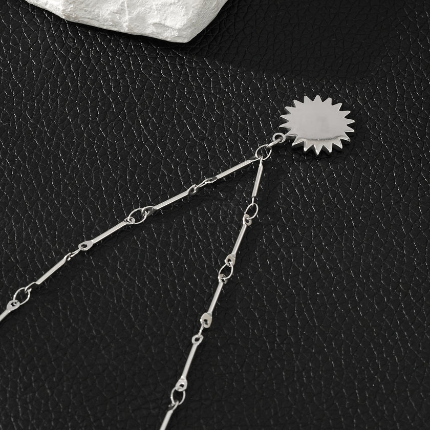 NOMIA Or Blanc (Couleur Argent) : Collier avec pendentif soleil rayonnant en zircone.