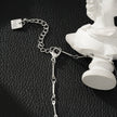 NOMIA Or Blanc (Couleur Argent) : Collier avec pendentif soleil rayonnant en zircone.