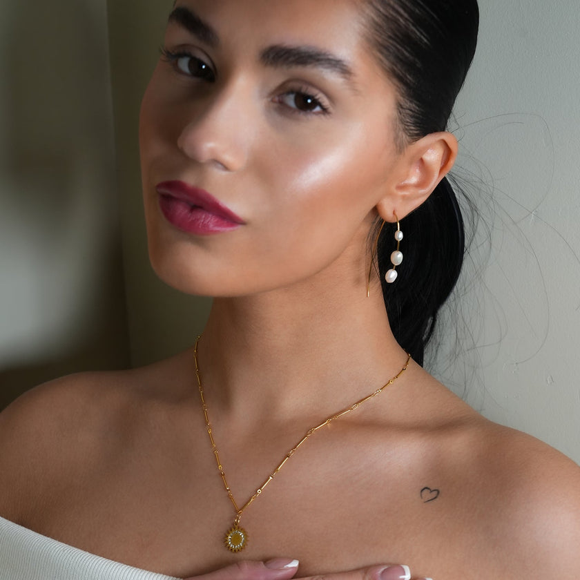 NOMIA Gold: Radiant Sunburst Pendant Zirconia Chain Necklace