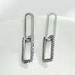 Boucles d'oreilles argentées LUCIANA, double agrafe, pavé de zircons.