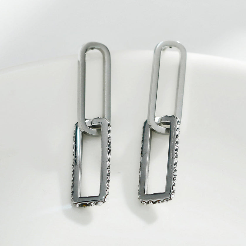 Boucles d'oreilles argentées LUCIANA, double agrafe, pavé de zircons.