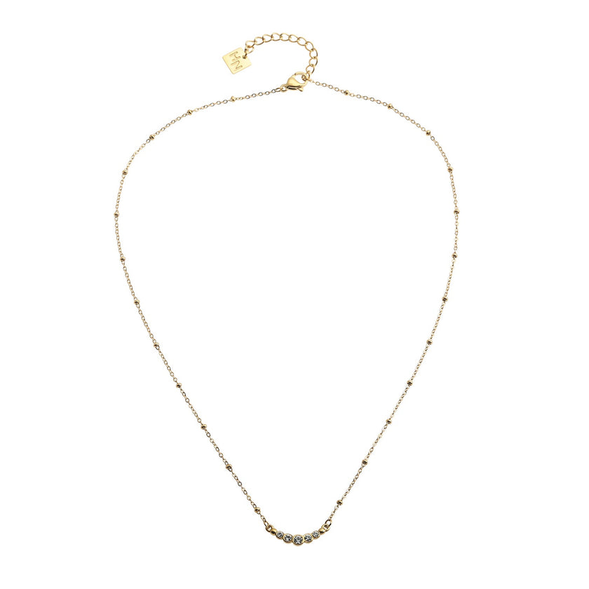 Chaîne dorée perlée KIMI avec pendentif en zircone pavé délicat.