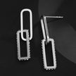 Boucles d'oreilles argentées LUCIANA, double agrafe, pavé de zircons.