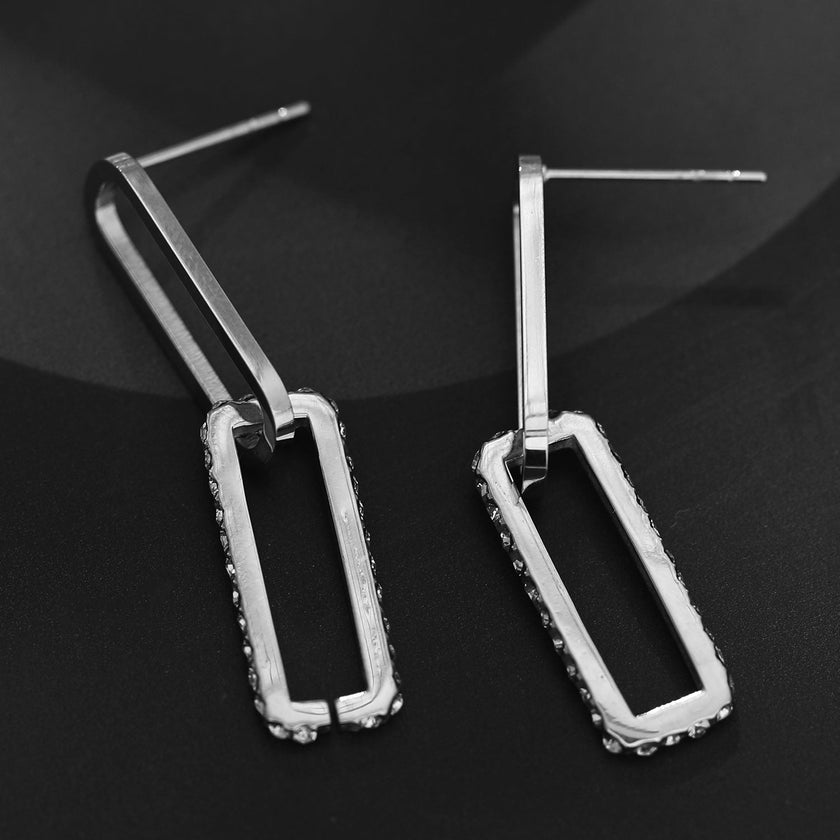 Boucles d'oreilles argentées LUCIANA, double agrafe, pavé de zircons.