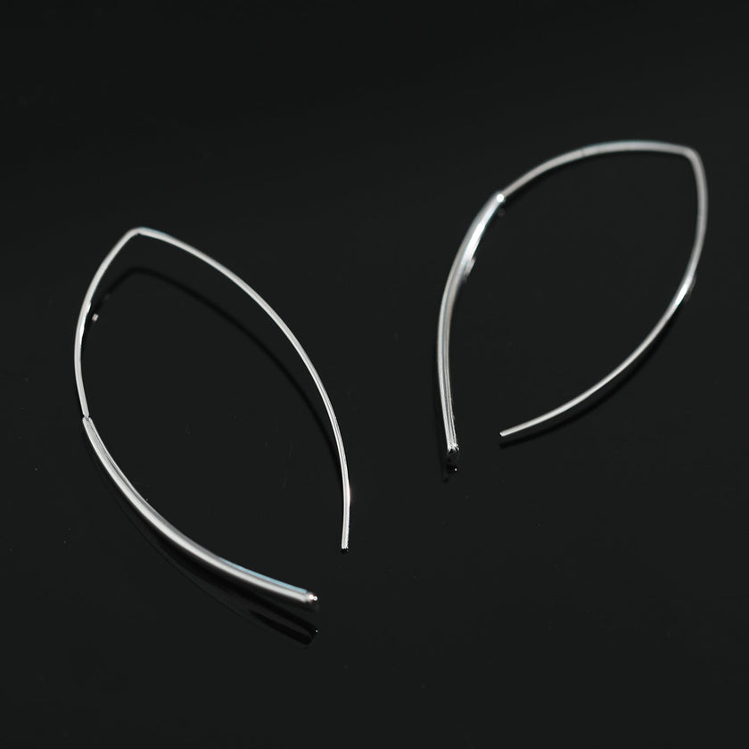 Boucles d'oreilles argentées XIMENA à motifs géométriques incurvés
