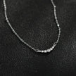 Chaîne en argent perlée KIMI avec pendentif en zircone pavé délicat.