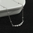 Chaîne en argent perlée KIMI avec pendentif en zircone pavé délicat.