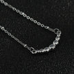 Chaîne en argent perlée KIMI avec pendentif en zircone pavé délicat.