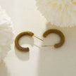 Boucles d'oreilles en forme de cercle en or à texture riche de KUMASI