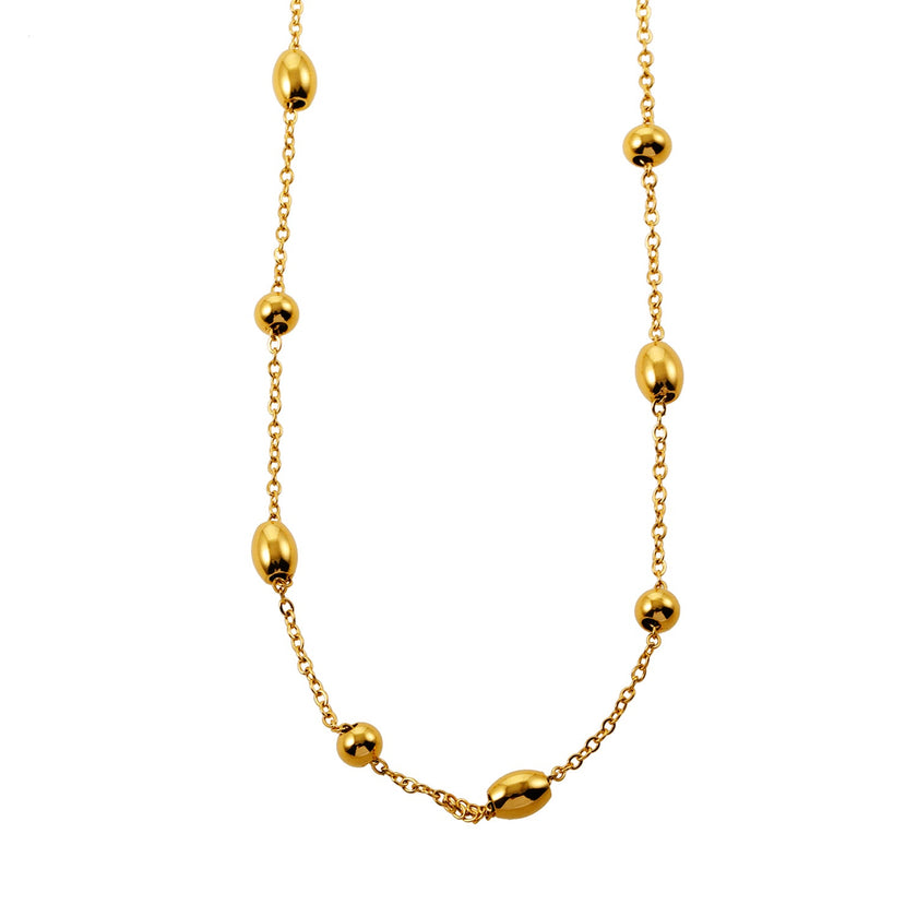 VIGO : Collier en chaîne dorée avec perles ovales et rondes, simple et essentiel.