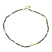 Collier LINA en cristal noir et perles dorées.