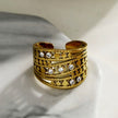 Bague BUENA à plusieurs anneaux sertie de zircone.