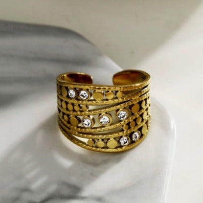 Bague BUENA à plusieurs anneaux sertie de zircone.