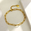 HAKILA : Bracelet en chaîne à maillons dorés, style trombone, essentiel.