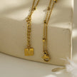 HILDA: Two-in-One Square Beads & Round Beads in Black & Gold Bracelet.