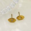 TINDRA : Boucles d'oreilles en forme d'ovale en or avec un zircon solitaire.