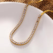 MESTIA : Collier combiné avec chaînes à texture peau de serpent et chaînes tennis.