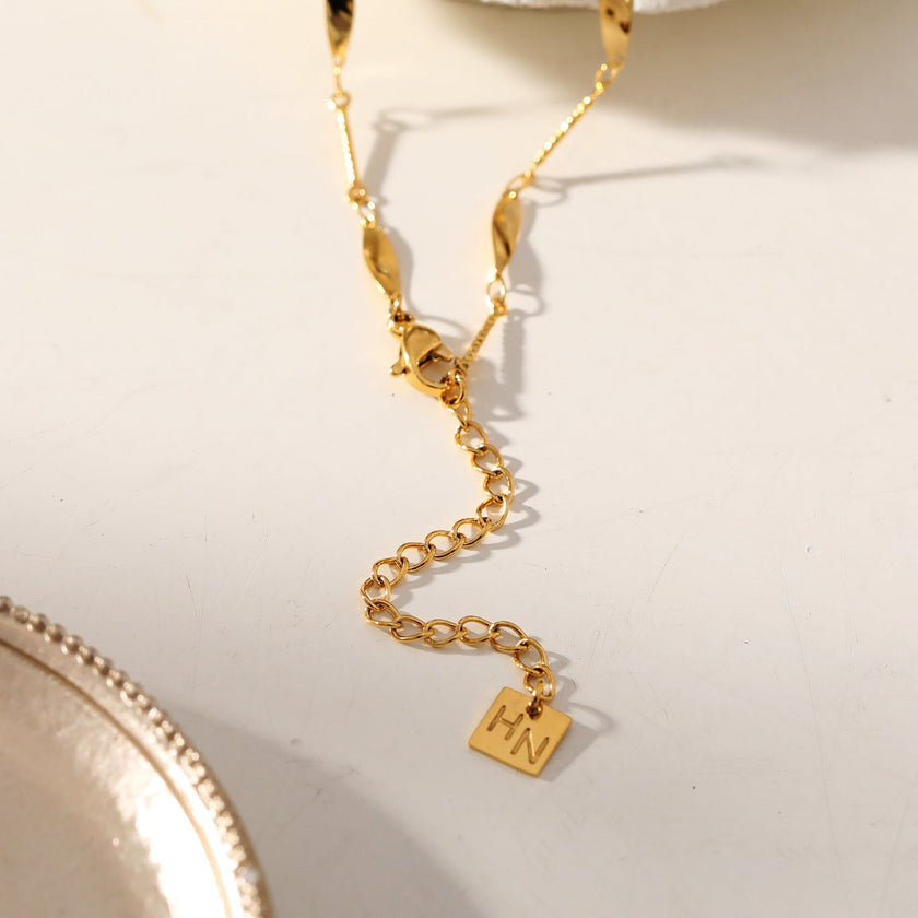 OTTIS: Twisted Oval Links & Textured Bars Chain Necklace
