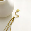 TELMA: Lariat Style Multi Stranded Necklace.